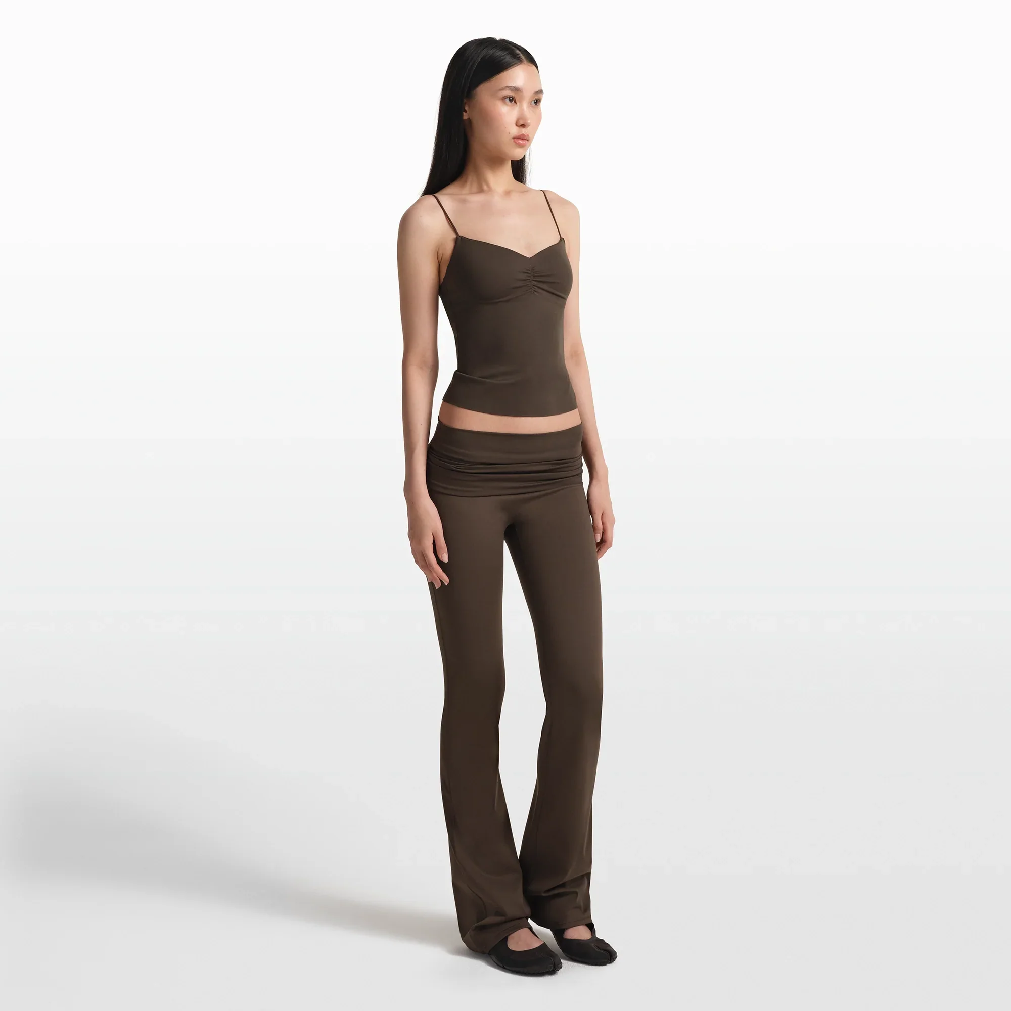 NikeSKIMS MATTE FOLDOVER WB SLIM FLARE 33 INCH LEGGING | DARK SEPIA - Image 2