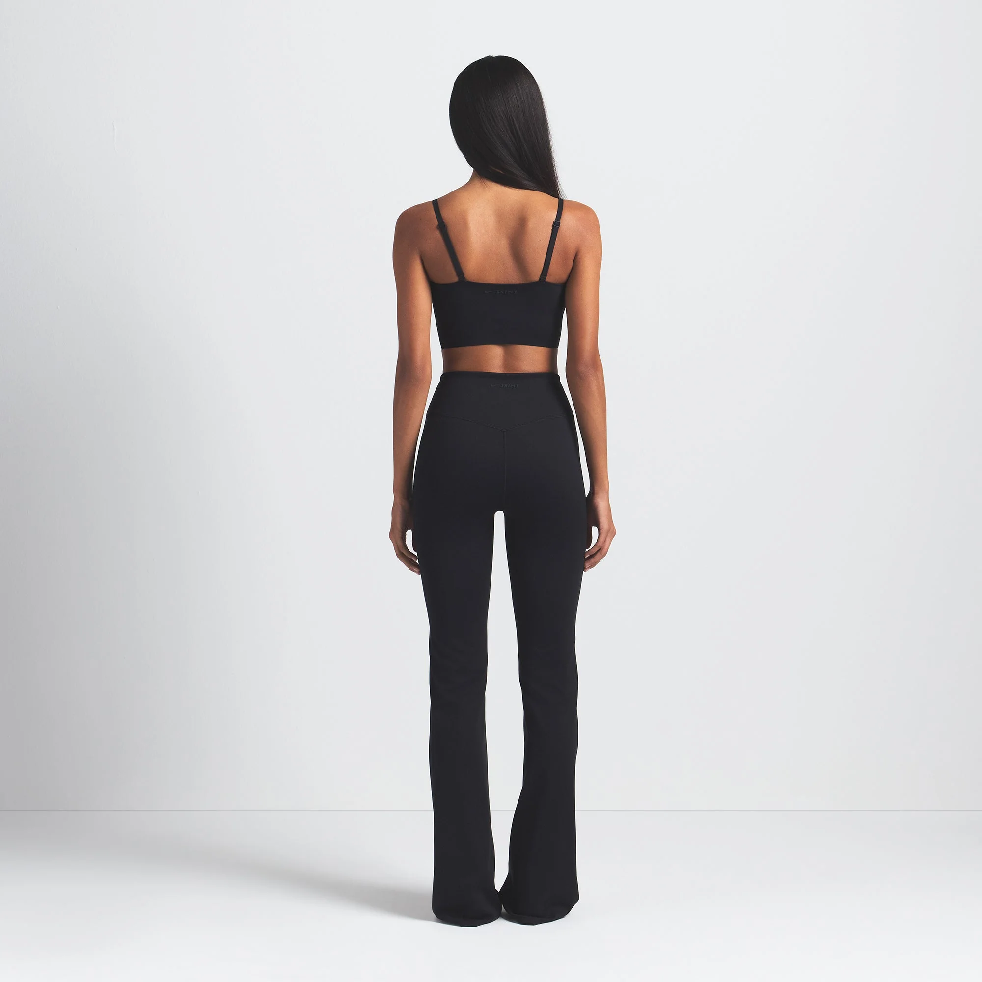 NikeSKIMS MATTE SLIM FLARE LEGGING | OBSIDIAN - Image 3