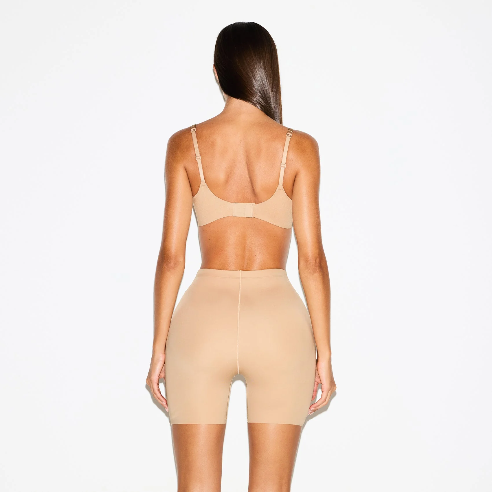 SKIMS BODY BUTT AND HIP ENHANCING MID THIGH SHORT | CLAY - Image 4